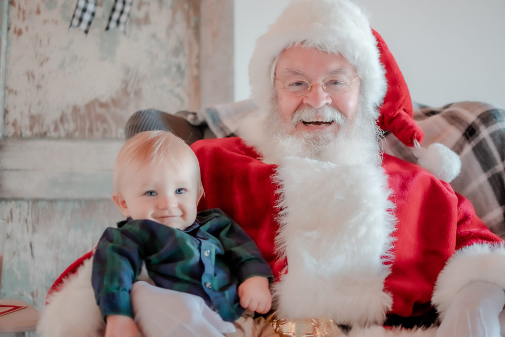 Santa Claus and baby boy during 2020 Santa Mini photo session