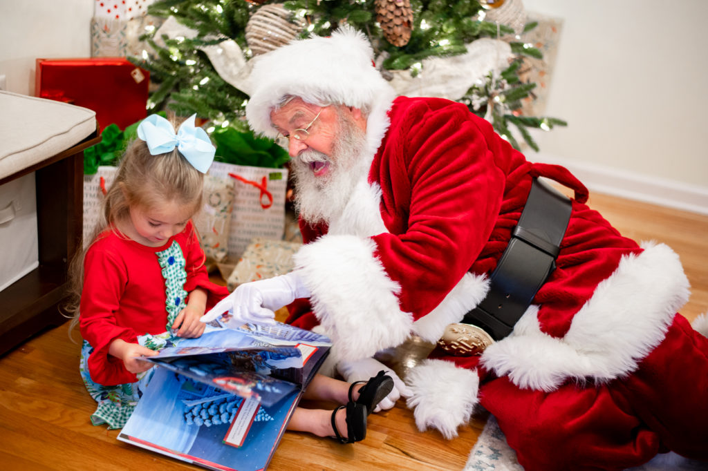 Santa Claus with young girl 