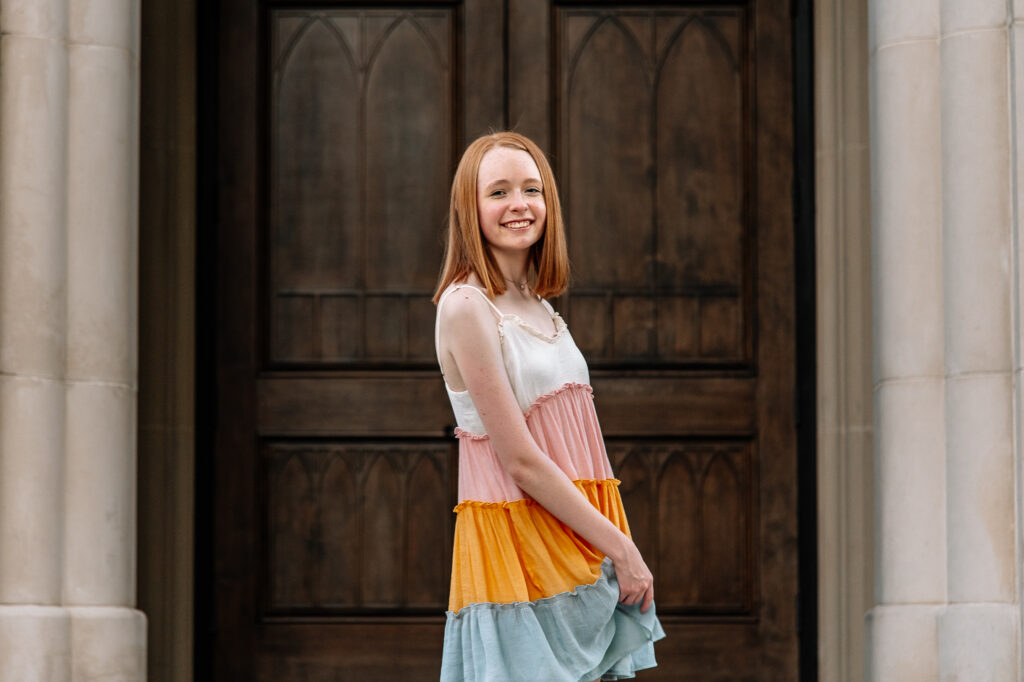 What to Wear for Your Senior Pictures – Seasonal Outfit Ideas for high school Seniors - Senior girl wearing light summer dress at Lee University - Cleveland, TN